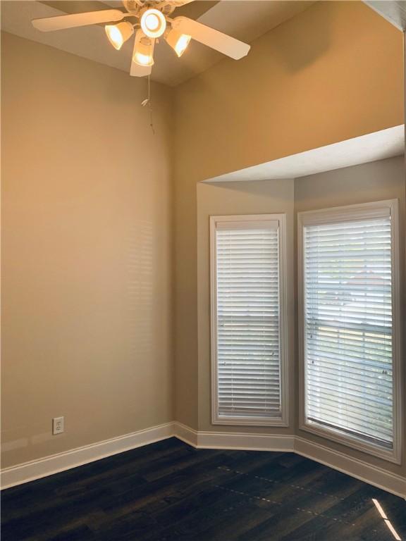 3672 Hawthorne Ct, Auburn, AL 36830 - spare room with ceiling fan and dark wood finished floors