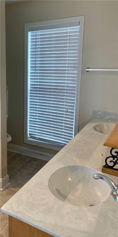 3672 Hawthorne Ct, Auburn, AL 36830 - bathroom with double vanity and tile patterned flooring