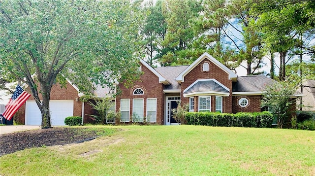 3672 Hawthorne Ct, Auburn, AL 36830 - view of front of property with a front lawn, concrete driveway, and brick siding