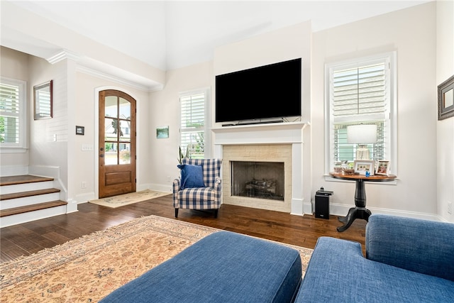 554 Arbor Dr, Auburn, AL 36830 - living area with wood finished floors, a fireplace, and stairway