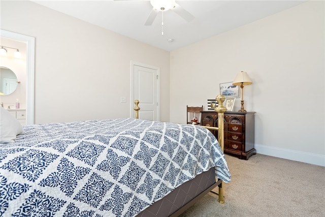 554 Arbor Dr, Auburn, AL 36830 - carpeted bedroom with a ceiling fan and ensuite bath