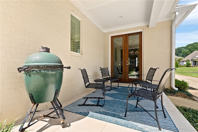 554 Arbor Dr, Auburn, AL 36830 - view of patio featuring french doors and grilling area