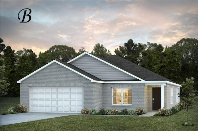 view of front of home with a lawn and a garage