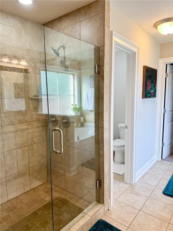 2457 Snowshill Ln, Auburn, AL 36832 - bathroom with toilet, tile patterned floors, and a stall shower