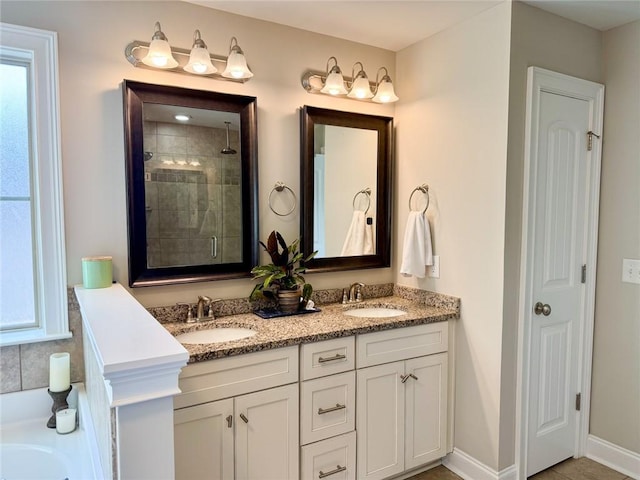 2457 Snowshill Ln, Auburn, AL 36832 - full bath with a shower stall, double vanity, and a bath