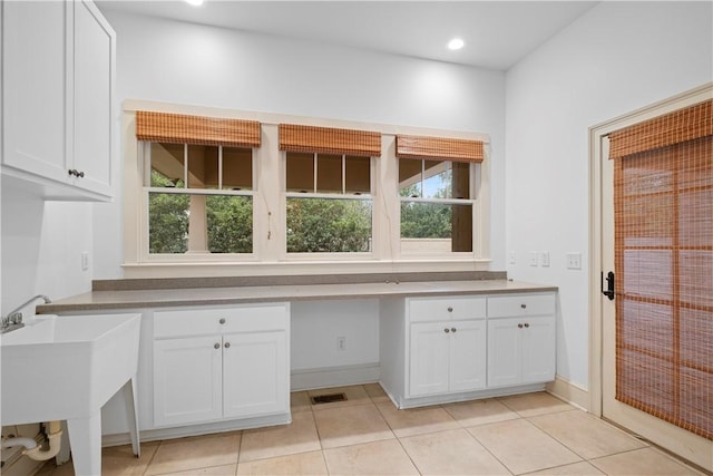 interior space featuring light tile patterned floors