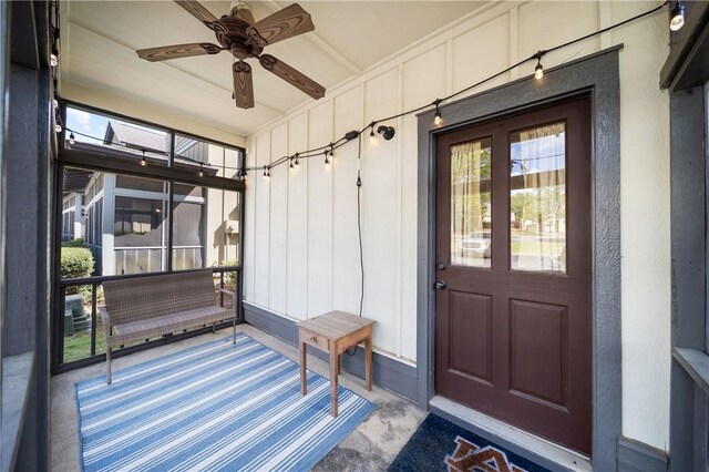 650 Dekalb St Unit 1130, Auburn, AL 36830 - view of exterior entry with board and batten siding and ceiling fan