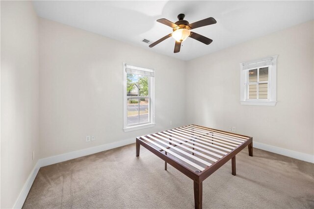 650 Dekalb St Unit 1130, Auburn, AL 36830 - bedroom featuring carpet floors and a ceiling fan