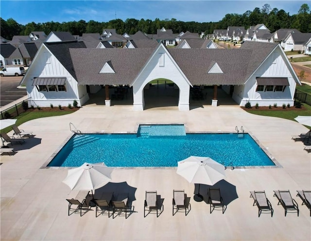 1242 Burrow Cir, Opelika, AL 36801 - outdoor pool featuring a patio area and a residential view