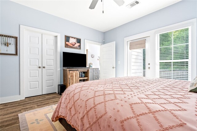 1242 Burrow Cir, Opelika, AL 36801 - bedroom featuring wood finished floors, ceiling fan, baseboards, a closet, and access to exterior