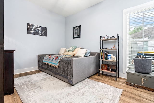1242 Burrow Cir, Opelika, AL 36801 - bedroom featuring wood finished floors and baseboards