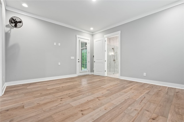 empty room with crown molding, baseboards, recessed lighting, and light wood-style floors