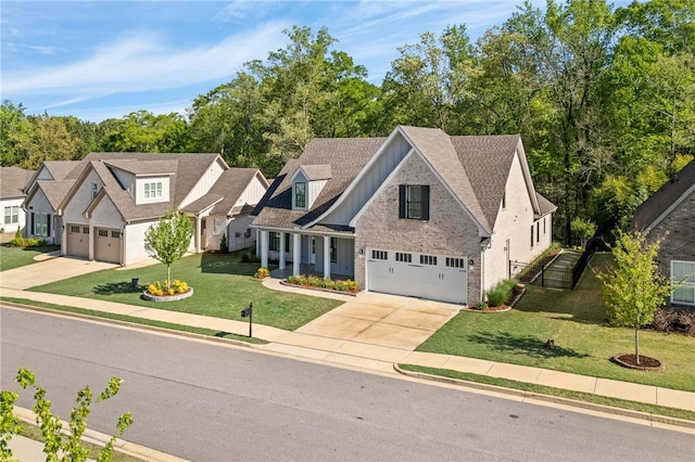 view of front of house featuring roof with shingles, driveway, board and batten siding, a front yard, and a garage