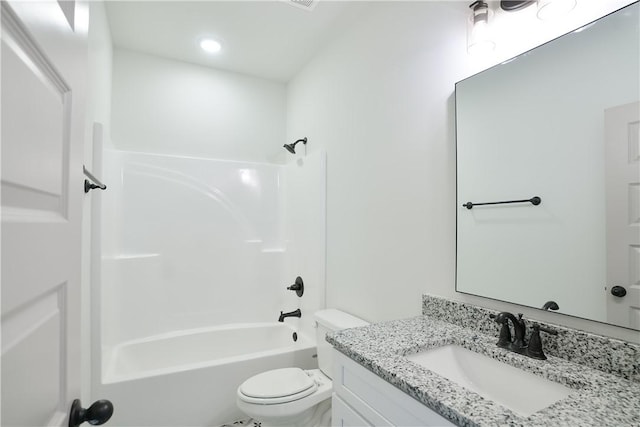 full bath featuring toilet, shower / washtub combination, and vanity