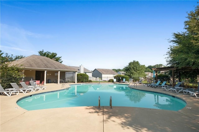 2711 Tara Ct, Opelika, AL 36804 - community pool featuring a pergola and a patio
