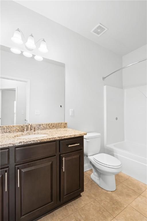 2711 Tara Ct, Opelika, AL 36804 - full bathroom featuring vanity, tile patterned flooring, and bathtub / shower combination