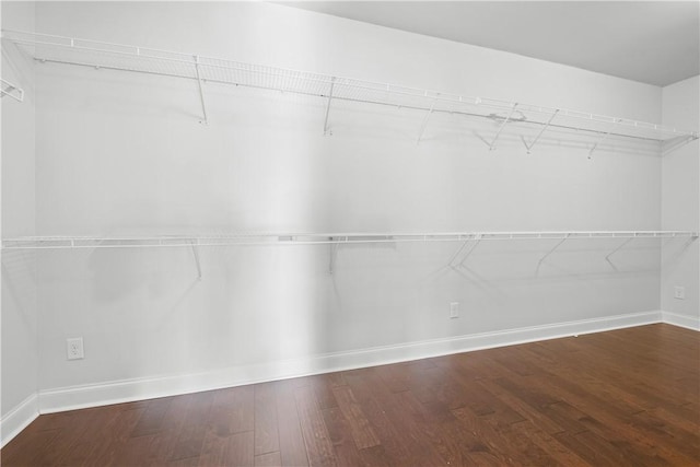 2711 Tara Ct, Opelika, AL 36804 - walk in closet featuring wood finished floors