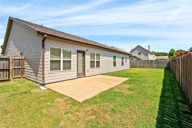 2711 Tara Ct, Opelika, AL 36804 - rear view of house with a patio area and a fenced backyard