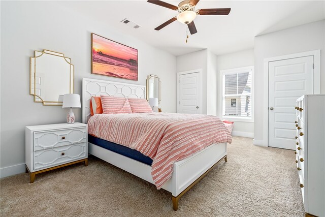 617 Cameron Ct, Auburn, AL 36830 - bedroom with light carpet, baseboards, and ceiling fan