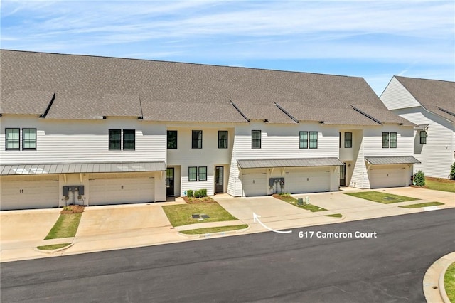 617 Cameron Ct, Auburn, AL 36830 - townhome / multi-family property featuring an attached garage and driveway