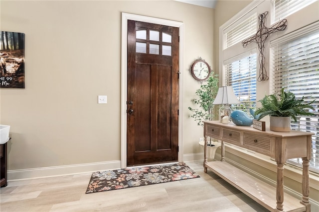 foyer entrance featuring light hardwood / wood-style floors