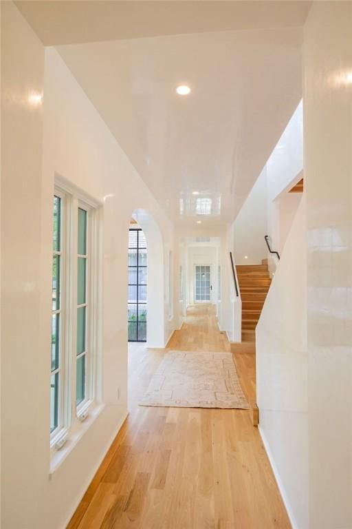 hallway with light wood-type flooring