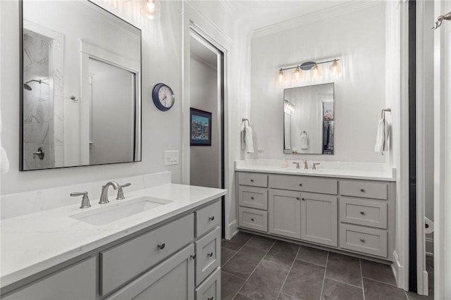 bathroom featuring a shower, tile patterned flooring, vanity, and ornamental molding