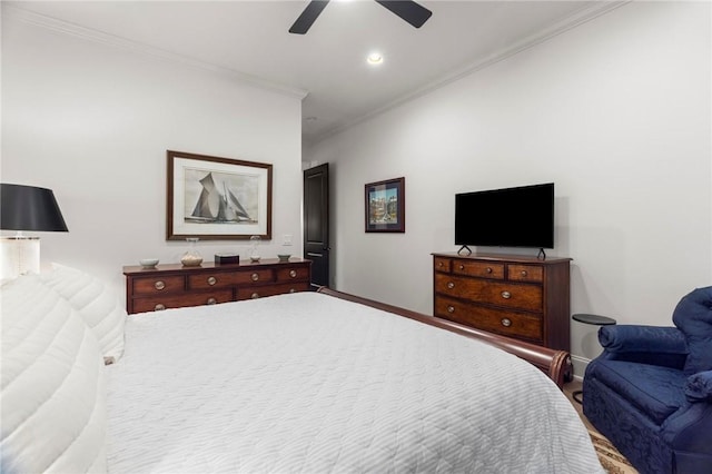 bedroom featuring ceiling fan and ornamental molding