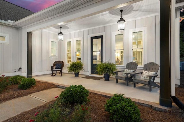 patio terrace at dusk with covered porch