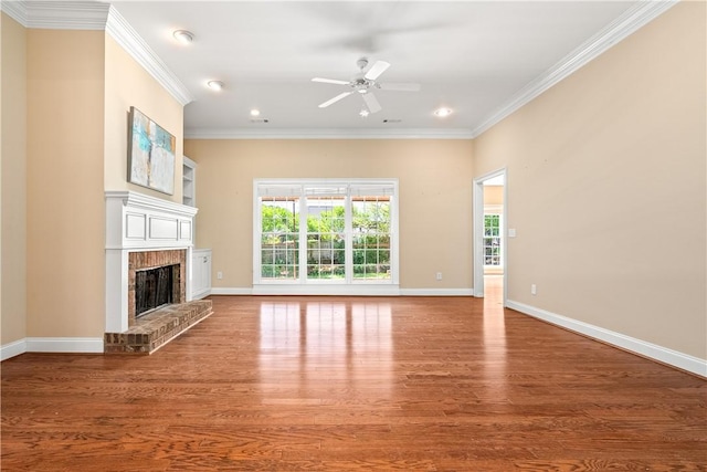 1817 Roanoke Ln, Auburn, AL 36830 - unfurnished living room featuring recessed lighting, crown molding, ceiling fan, a fireplace, and wood finished floors