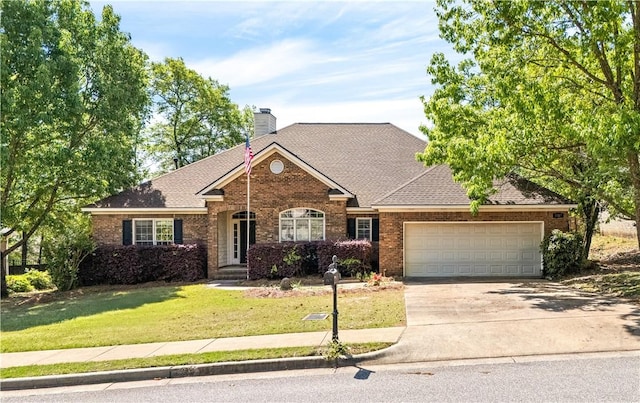 1817 Roanoke Ln, Auburn, AL 36830 - view of front facade featuring a garage, a front yard, concrete driveway, brick siding, and a chimney