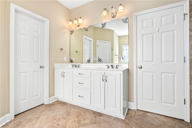 1817 Roanoke Ln, Auburn, AL 36830 - bathroom with double vanity and tile patterned flooring