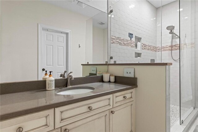 1630 Academy Dr Unit 402, Auburn, AL 36830 - bathroom with vanity and a tile shower