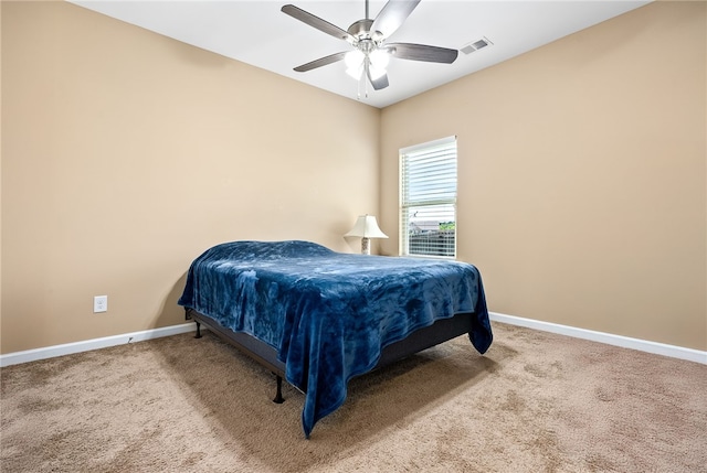 704 Lori Ln, Opelika, AL 36804 - carpeted bedroom featuring baseboards and a ceiling fan