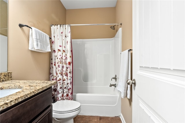 704 Lori Ln, Opelika, AL 36804 - full bathroom featuring vanity, shower / bath combo with shower curtain, and toilet