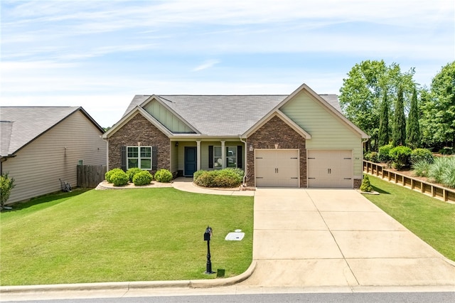 704 Lori Ln, Opelika, AL 36804 - view of front of home with concrete driveway, an attached garage, board and batten siding, and brick siding