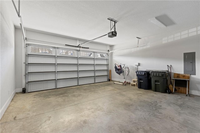 garage featuring a garage door opener, electric panel, and baseboards