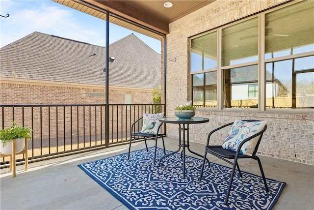 sunroom with beam ceiling