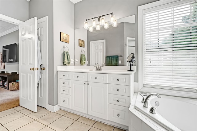 1939 Windway Rd, Auburn, AL 36830 - bathroom with plenty of natural light, tile patterned flooring, vanity, and a garden tub