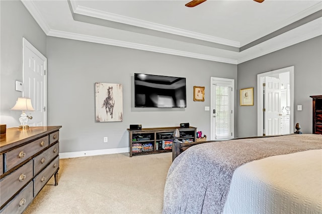1939 Windway Rd, Auburn, AL 36830 - bedroom featuring a raised ceiling, light colored carpet, crown molding, baseboards, and ceiling fan
