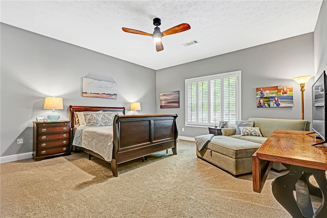 1939 Windway Rd, Auburn, AL 36830 - carpeted bedroom with baseboards, a ceiling fan, and a textured ceiling