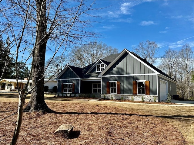 view of front of property featuring a garage and board and batten siding