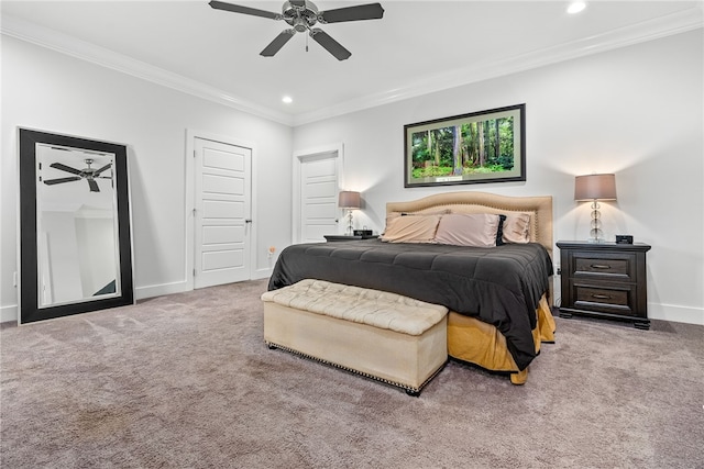bedroom featuring crown molding, ceiling fan, and carpet