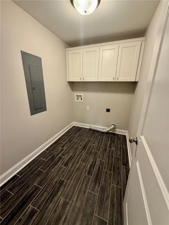 laundry area featuring electric dryer hookup, hookup for a washing machine, cabinets, and electric panel