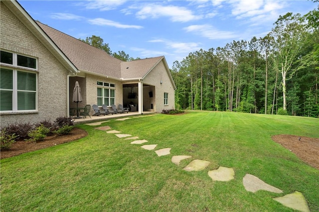 view of yard featuring a patio area