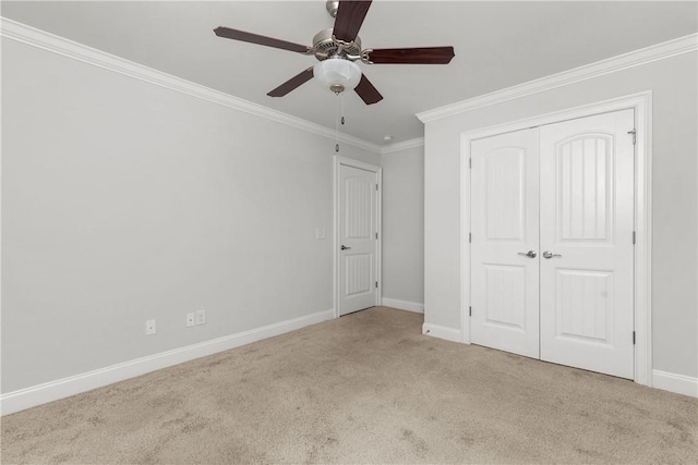 2388 Snowshill Ln, Auburn, AL 36832 - unfurnished bedroom with carpet floors, baseboards, ornamental molding, a closet, and a ceiling fan