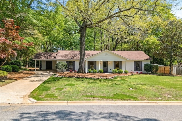 322 Cricket Ln, Auburn, AL 36832 - single story home with driveway, a porch, and a carport