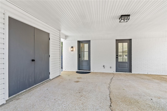322 Cricket Ln, Auburn, AL 36832 - property entrance with a patio and brick siding