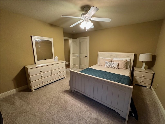 1336 Gatewood Dr, Auburn, AL 36830 - carpeted bedroom with baseboards and ceiling fan