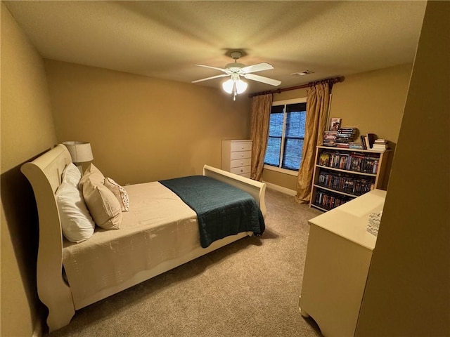 1336 Gatewood Dr, Auburn, AL 36830 - bedroom featuring carpet, a ceiling fan, and a textured ceiling